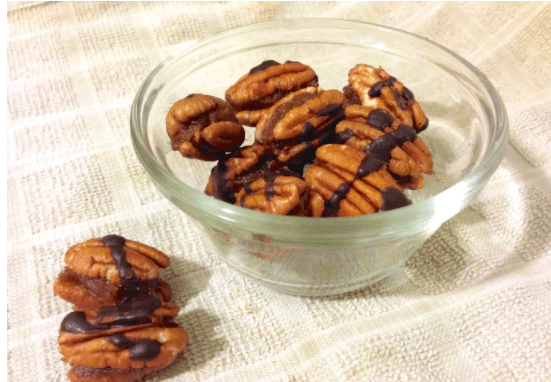 chocolate drizzeled caramel filled pecans