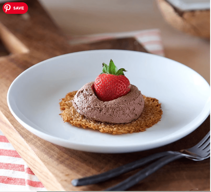 coconut tuiles with fresh strawberries and chocolate whipping cream